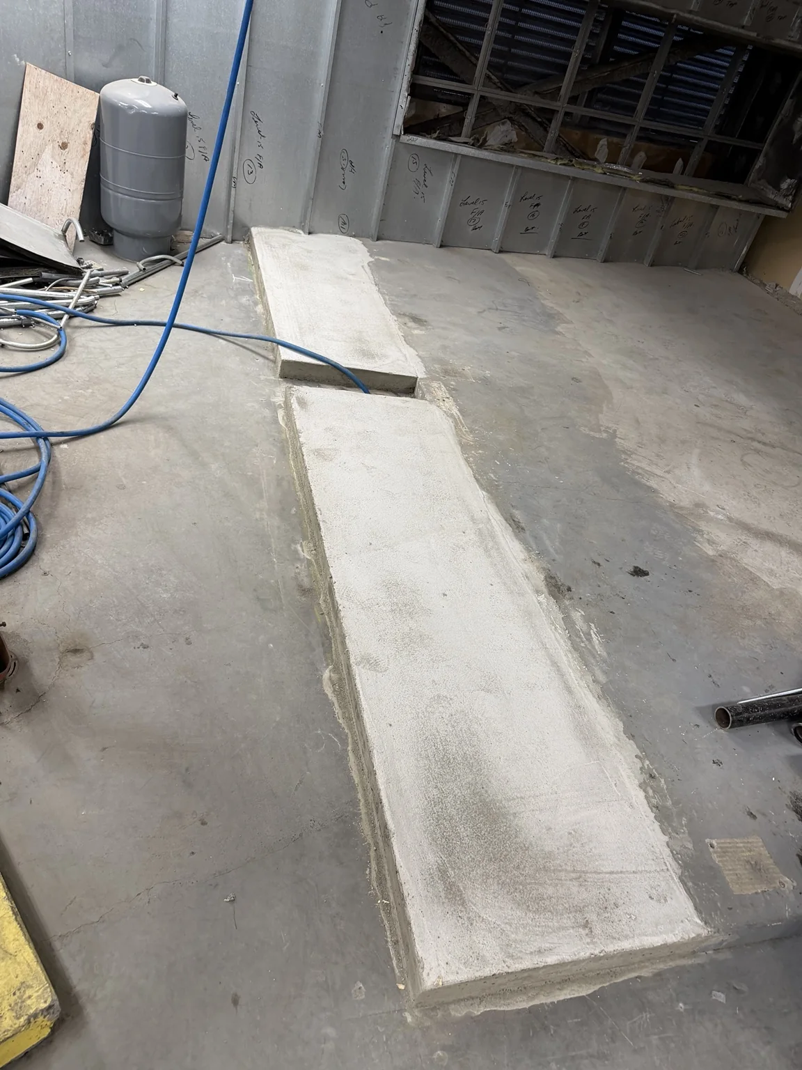 Finished concrete slab repair sections